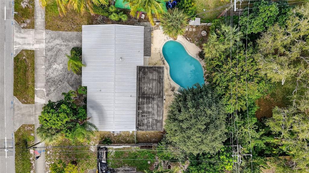 450 Northwest 12th Avenue Boca Raton, FL 33486 - Photo 57 of 58 a aerial view of a house with a yard and potted plants