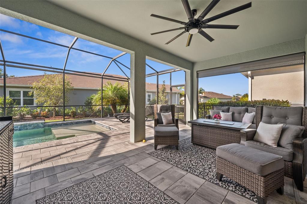 5632 Long Shore Loop Sarasota, FL 34238 - Photo 27 of 56 a living room with furniture and a large window
