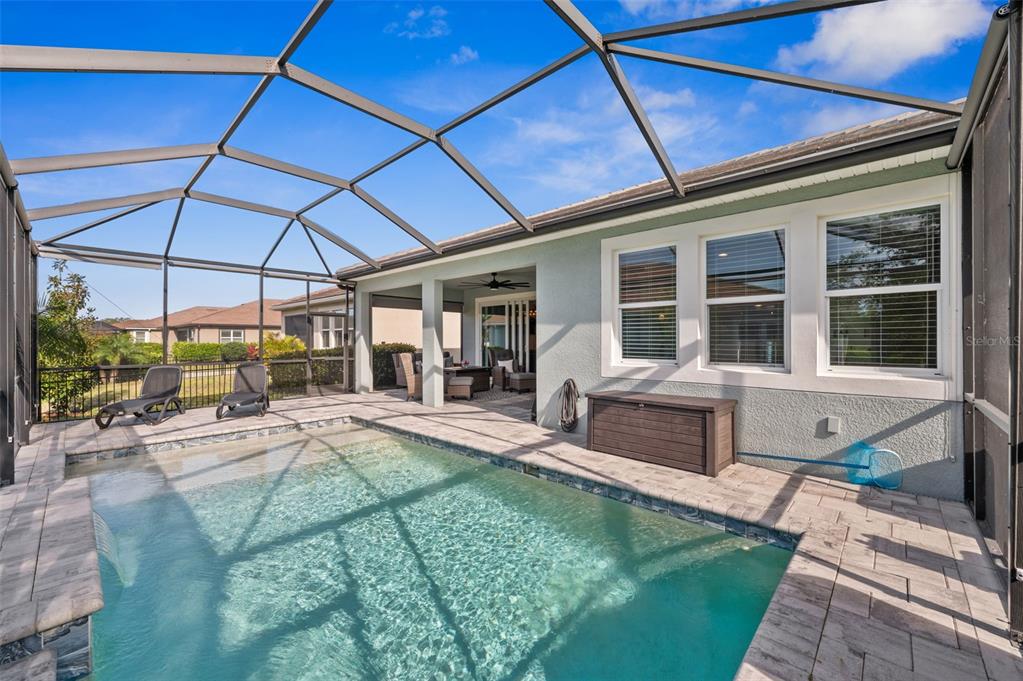 5632 Long Shore Loop Sarasota, FL 34238 - Photo 32 of 56 a view of a house with backyard from a patio