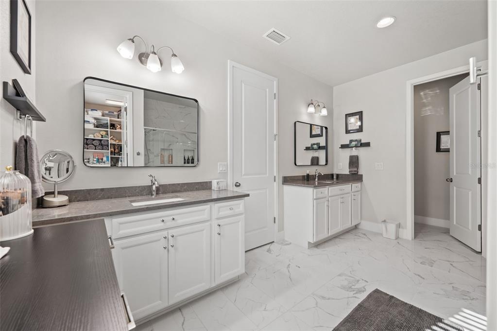 5632 Long Shore Loop Sarasota, FL 34238 - Photo 37 of 56 a kitchen with a sink and cabinets