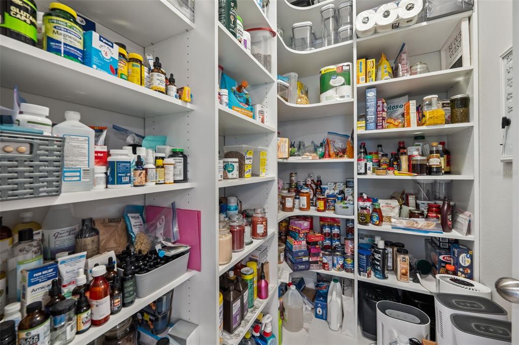 5632 Long Shore Loop Sarasota, FL 34238 - Photo 43 of 56 a store room with lots of clutter and other items