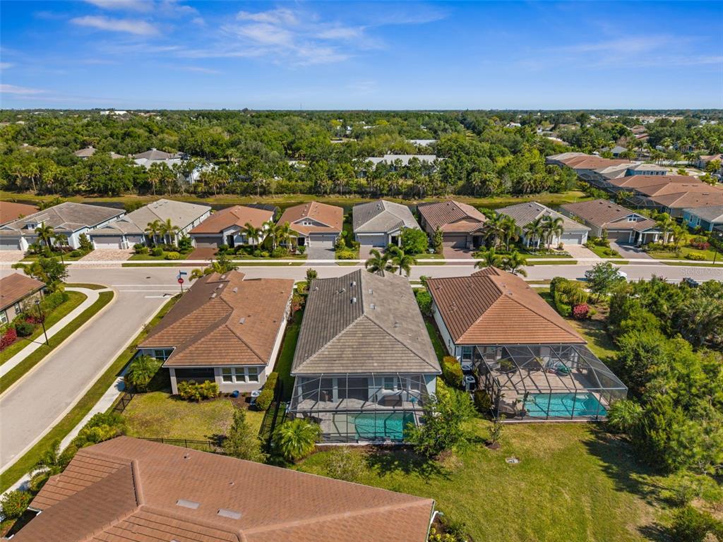 5632 Long Shore Loop Sarasota, FL 34238 - Photo 51 of 56 an aerial view of residential houses with outdoor space and street view
