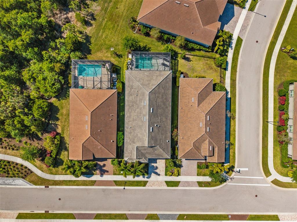 5632 Long Shore Loop Sarasota, FL 34238 - Photo 52 of 56 front view of a house with a street