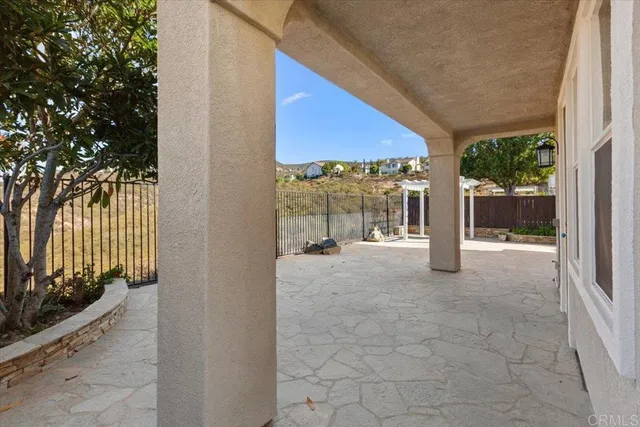 a view of a room with a balcony