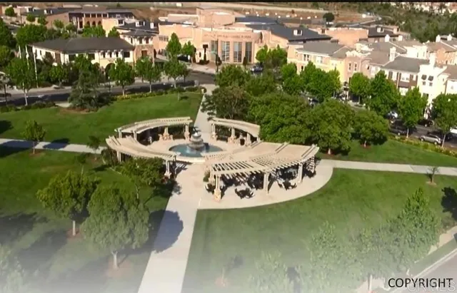 a view of a swimming pool with a garden
