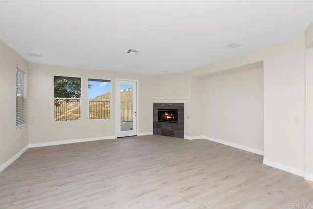 an empty room with windows