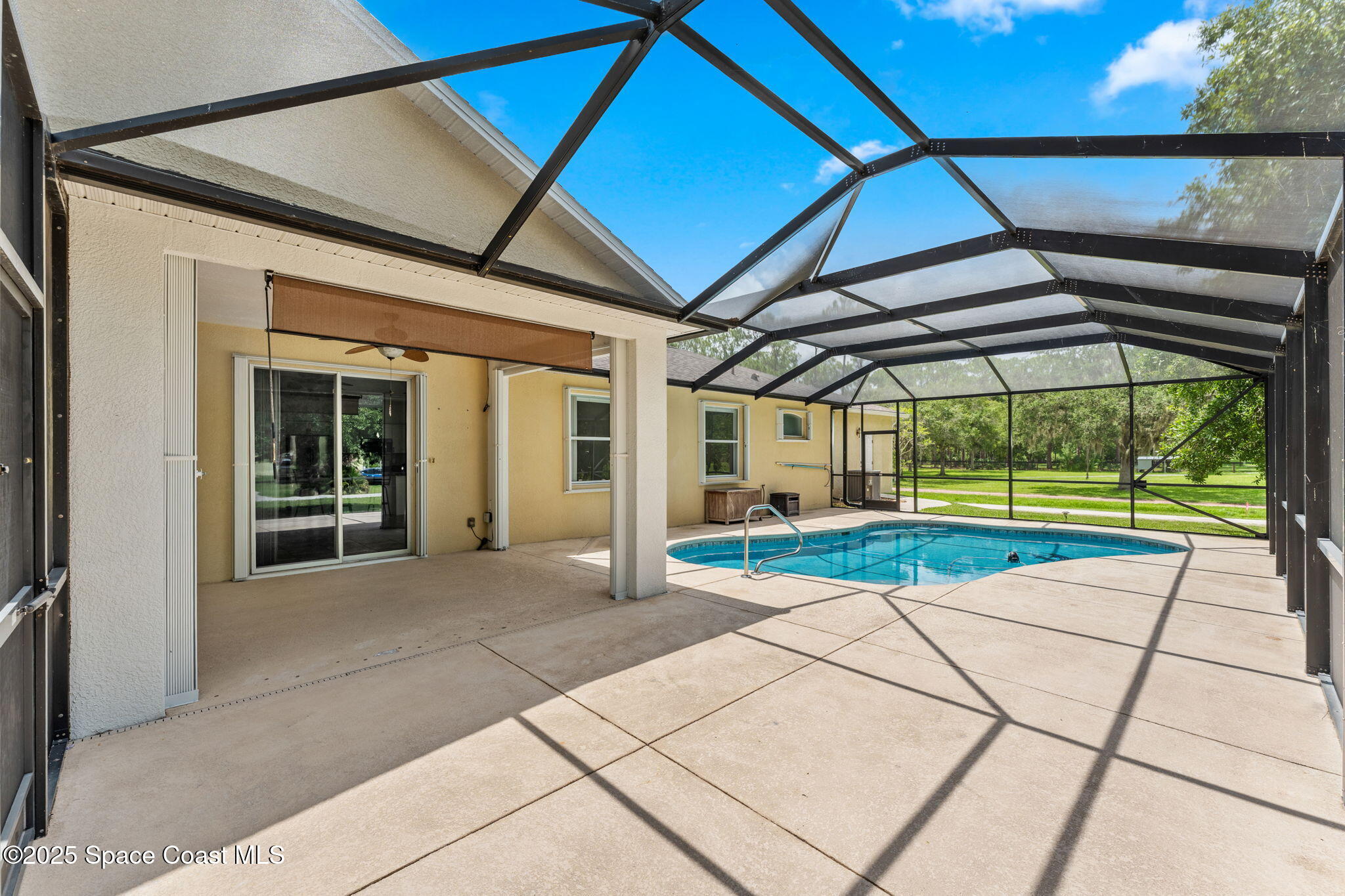 1385 Friday Road Cocoa, FL 32926 - Photo 22 of 33 a view of yard with porch and entertaining space