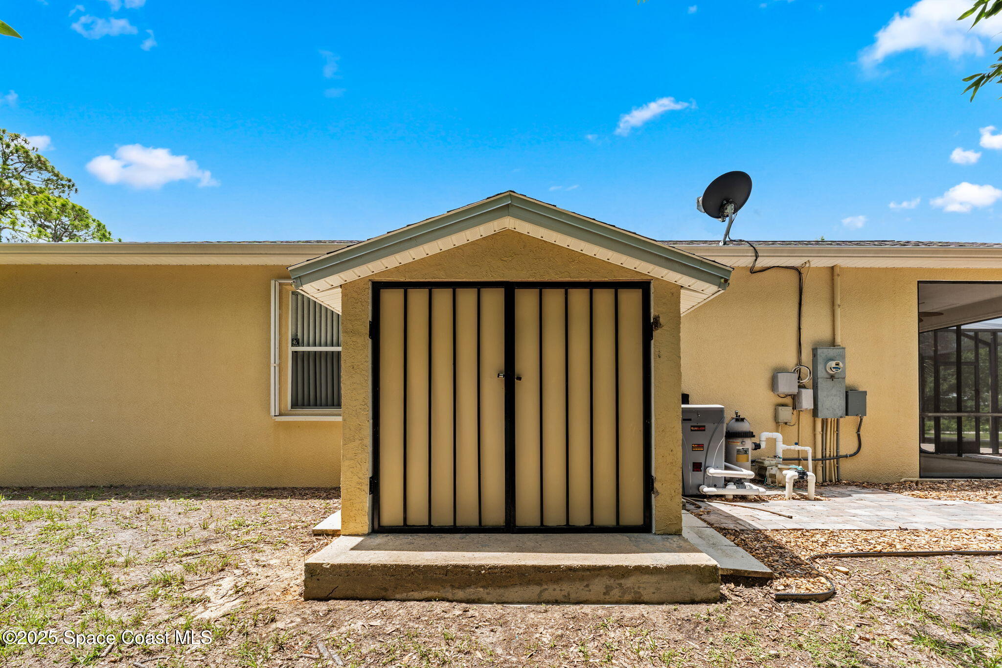 1385 Friday Road Cocoa, FL 32926 - Photo 28 of 33 a front view of a house with a yard
