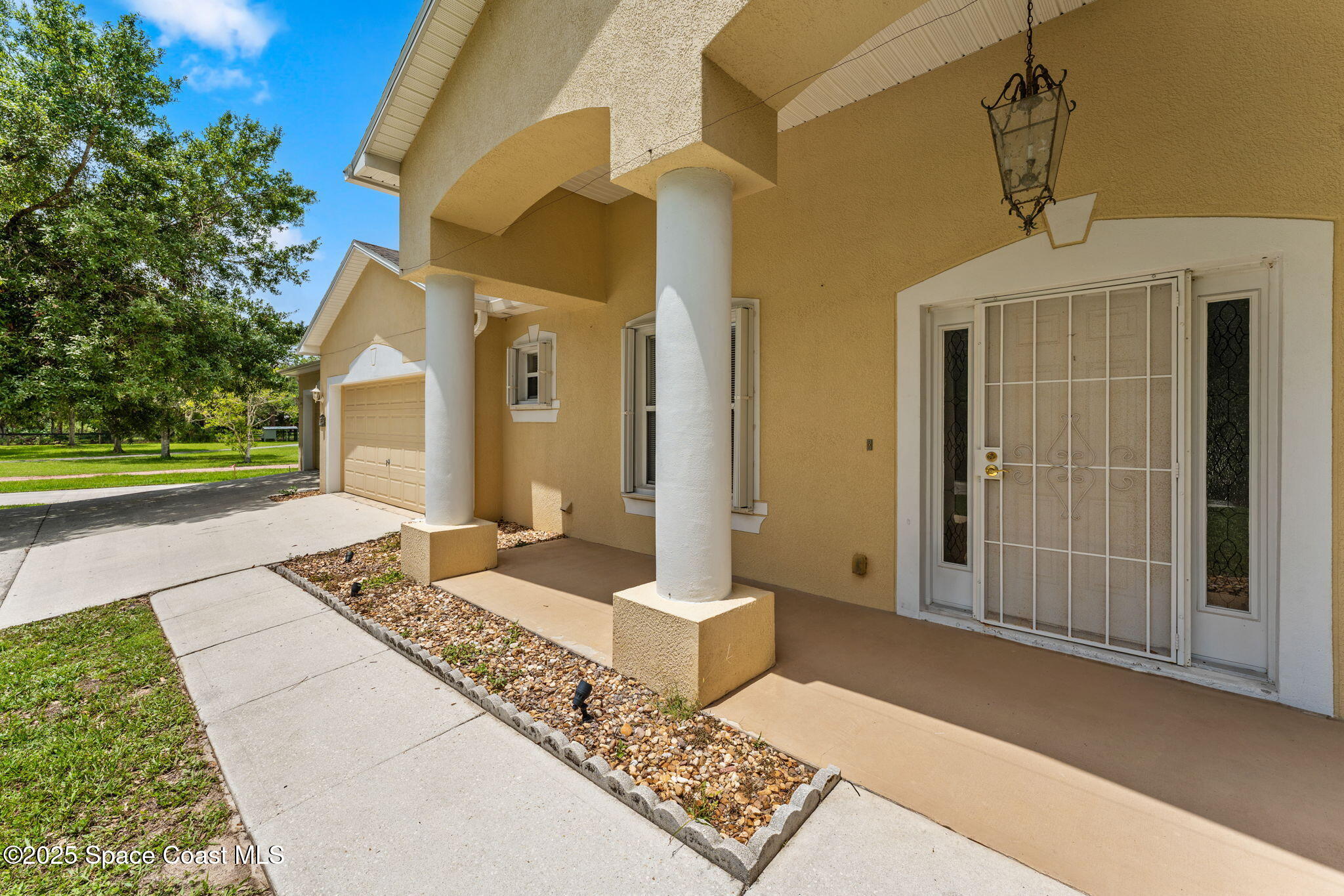 1385 Friday Road Cocoa, FL 32926 - Photo 5 of 33 a front view of a house with a outdoor space