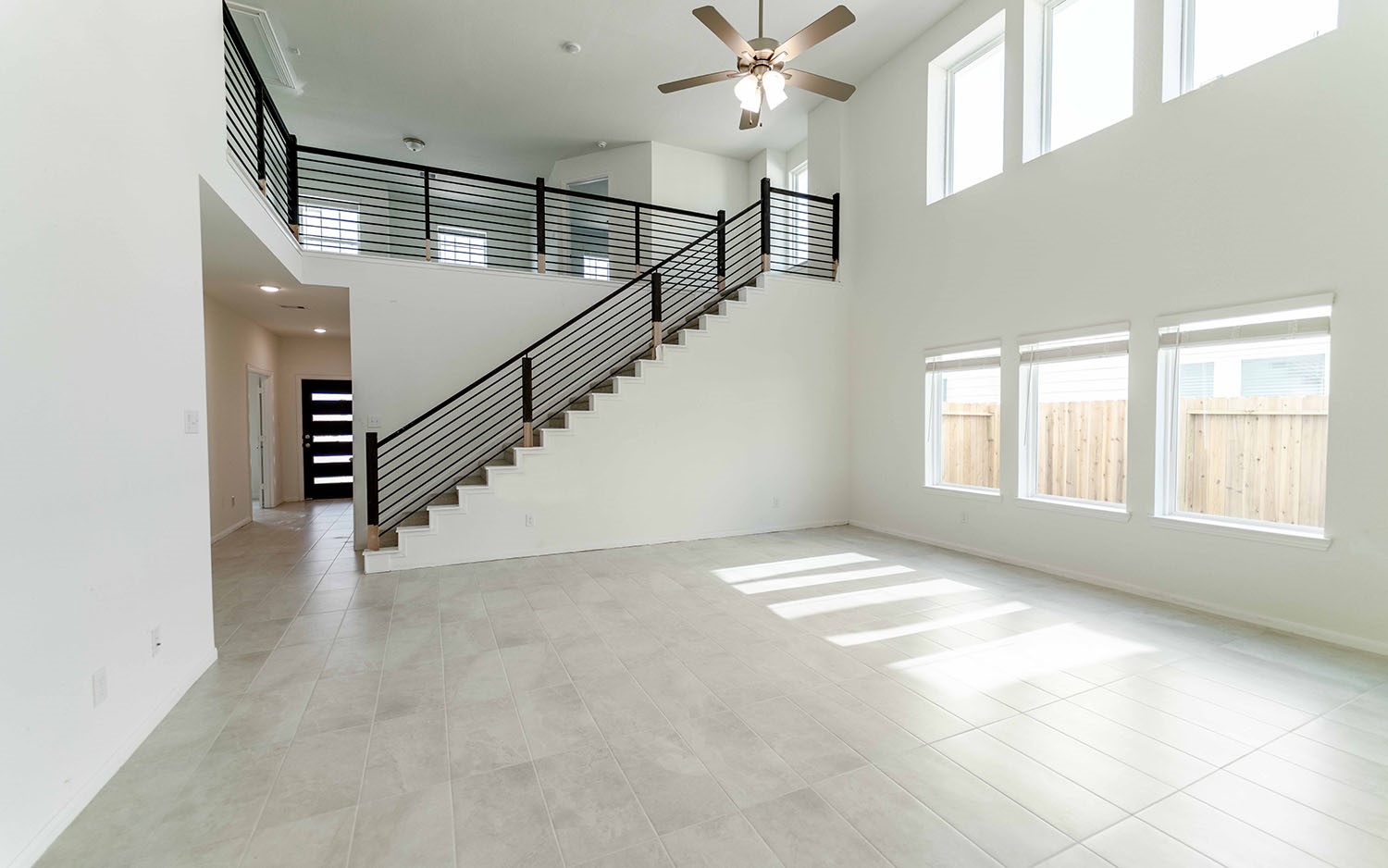 427 Monarch Trail Huntsville, TX 77340 - Photo 3 of 18 a view of an empty room with a window