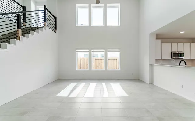 a view of an empty room and window