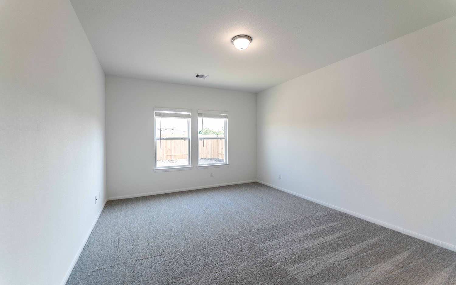 427 Monarch Trail Huntsville, TX 77340 - Photo 10 of 18 an empty room with a window