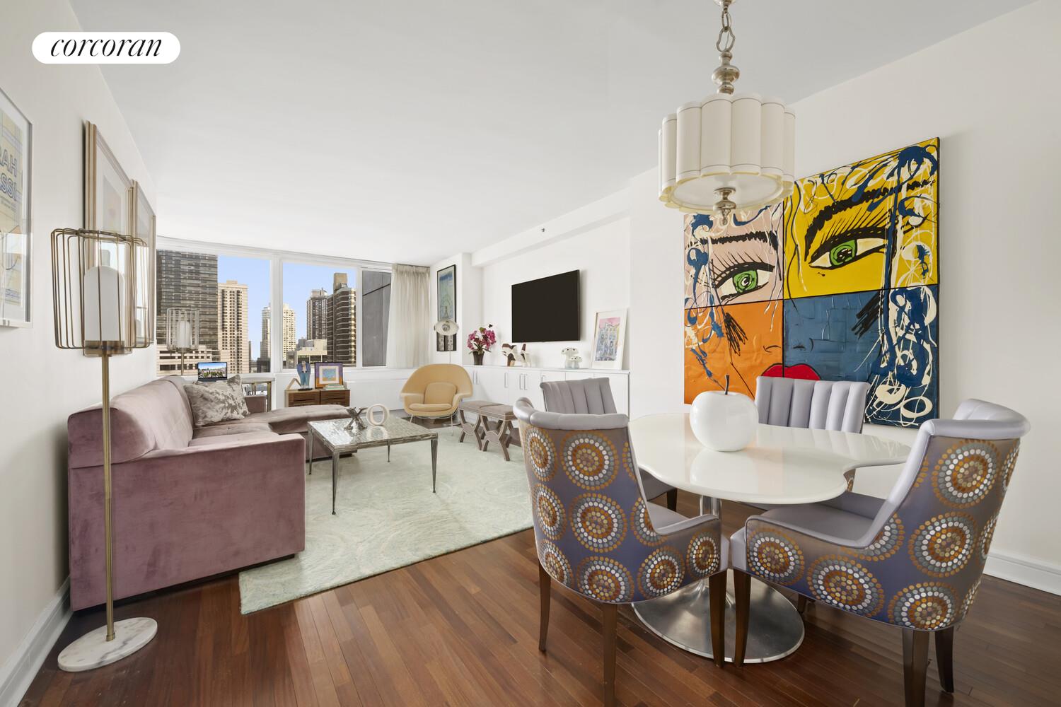 120 Riverside Boulevard, Unit PH1J Manhattan, NY 10069 - Photo 1 of 12 a living room with furniture and a flat screen tv