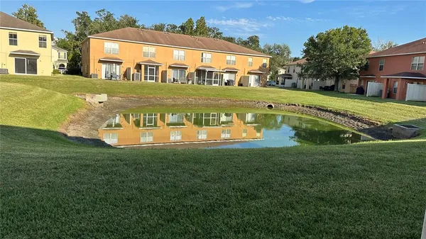 a view of a house with a swimming pool