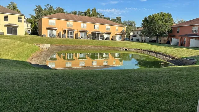 a view of a house with a swimming pool