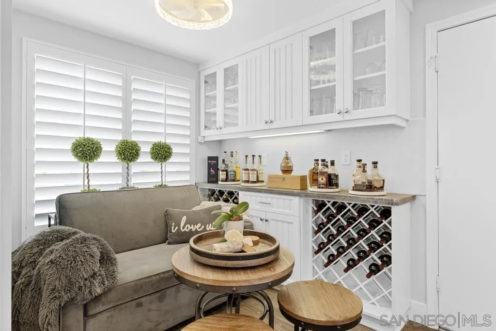 6905 Whitecap Drive Carlsbad, CA 92011 - Photo 21 of 66 a living room with furniture and a large window