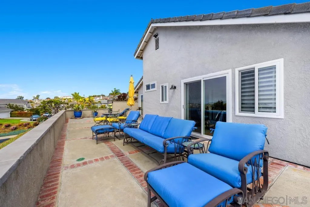 6905 Whitecap Drive Carlsbad, CA 92011 - Photo 42 of 66 a view of a chairs in patio of the house