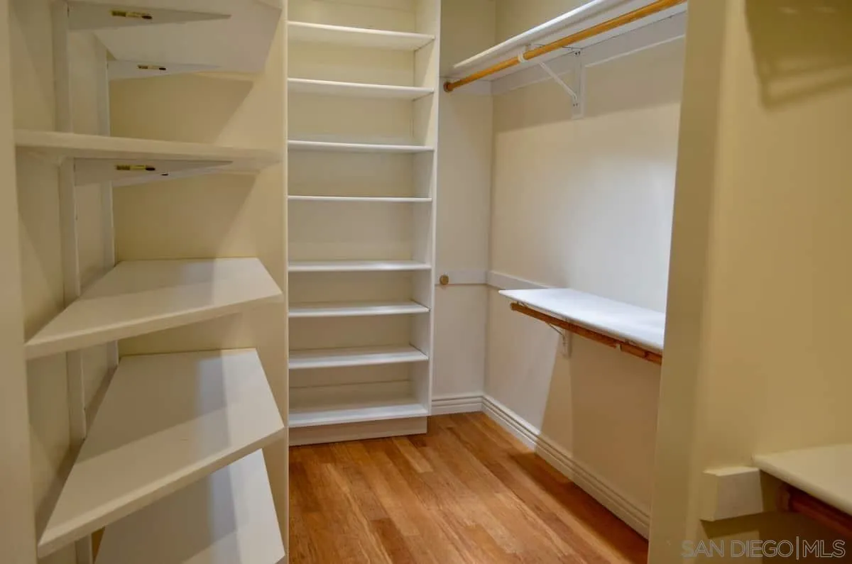 1235 Neptune Avenue Encinitas, CA 92024 - Photo 24 of 32 a view of walk in closet with empty racks