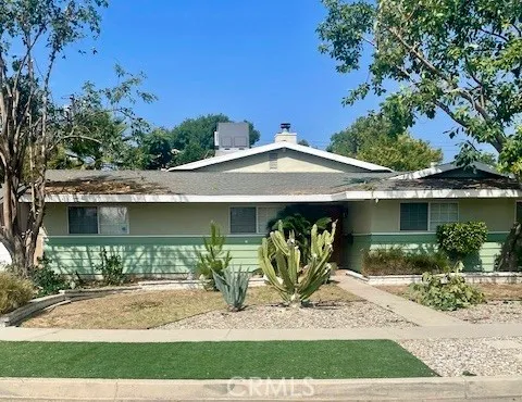 a front view of a house with a porch