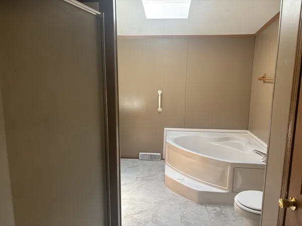 a bathroom with a white bath tub