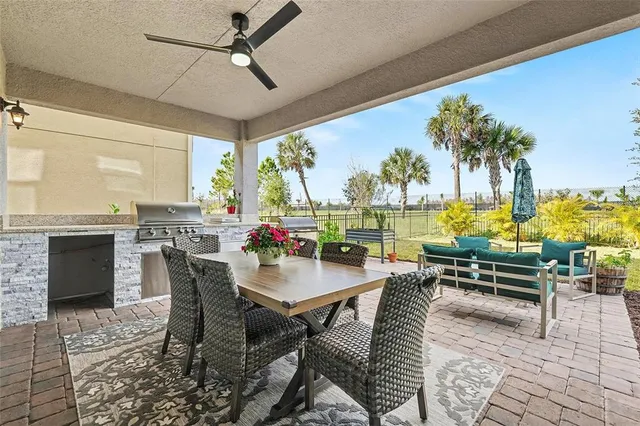 a view of a patio with swimming pool