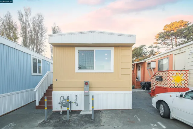 a car parked in front of a house