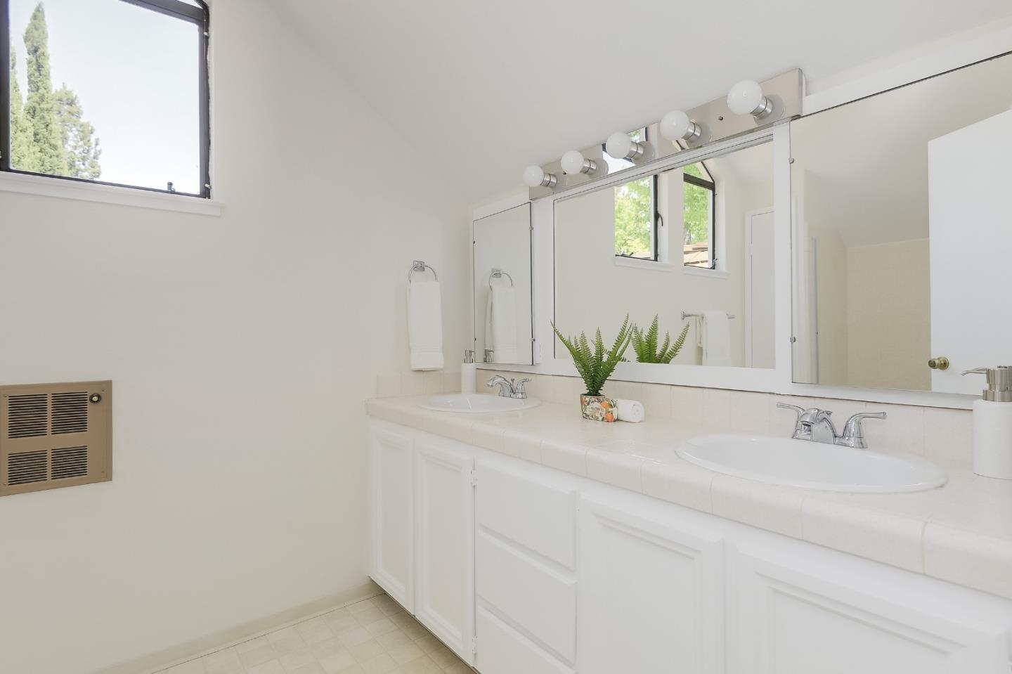 725 Rainbow Drive Mountain View, CA 94041 - Photo 11 of 23 a bathroom with a sink and a mirror