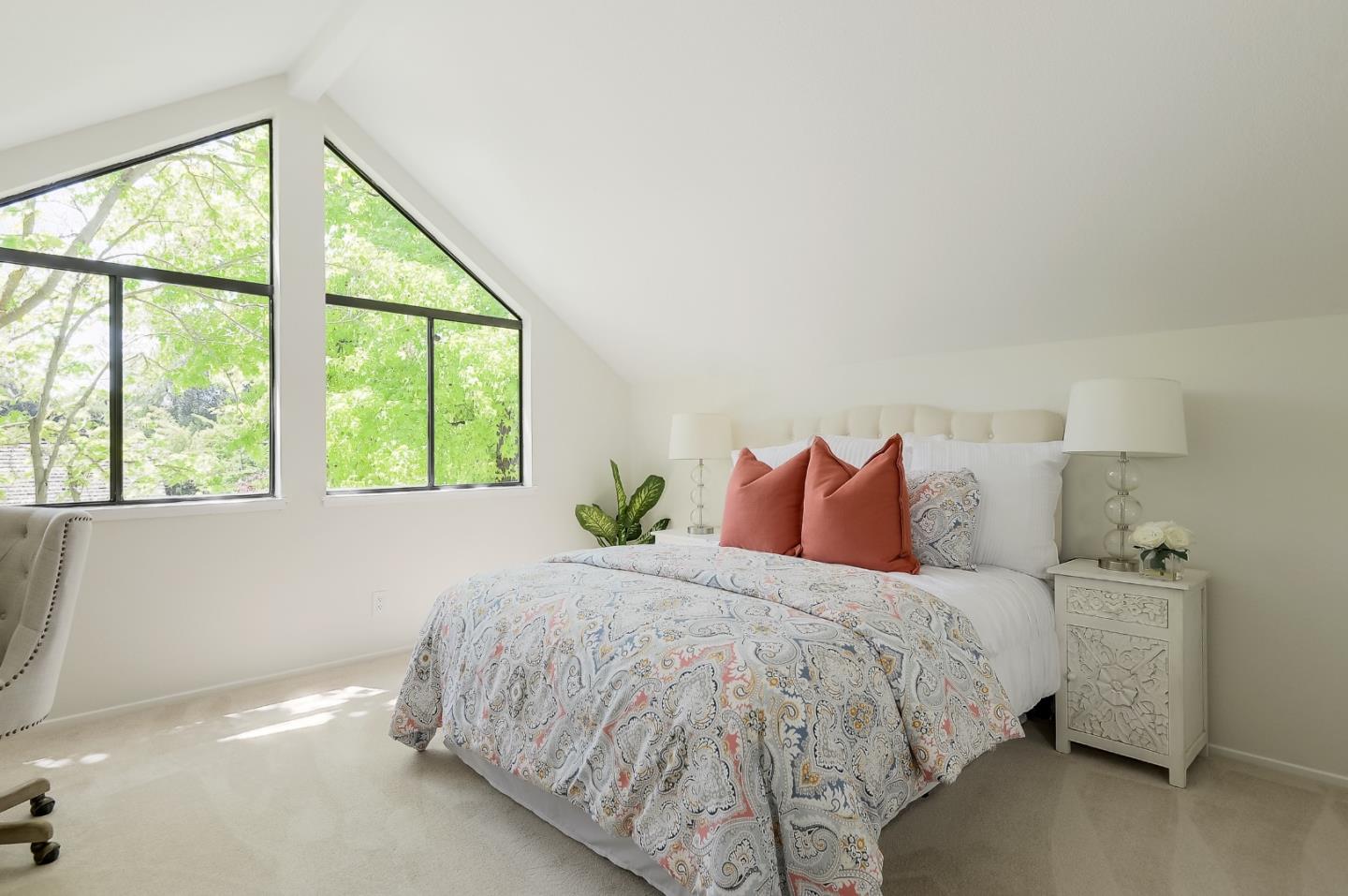 725 Rainbow Drive Mountain View, CA 94041 - Photo 14 of 23 a bedroom with a large bed and a large window