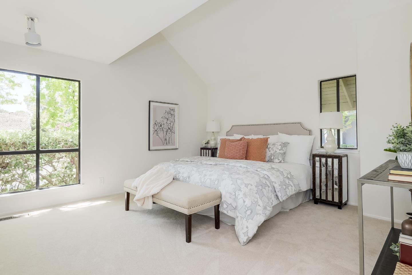 725 Rainbow Drive Mountain View, CA 94041 - Photo 15 of 23 a bedroom with a bed and a large window