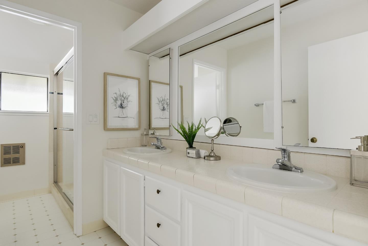 725 Rainbow Drive Mountain View, CA 94041 - Photo 16 of 23 a bathroom with a sink and a mirror