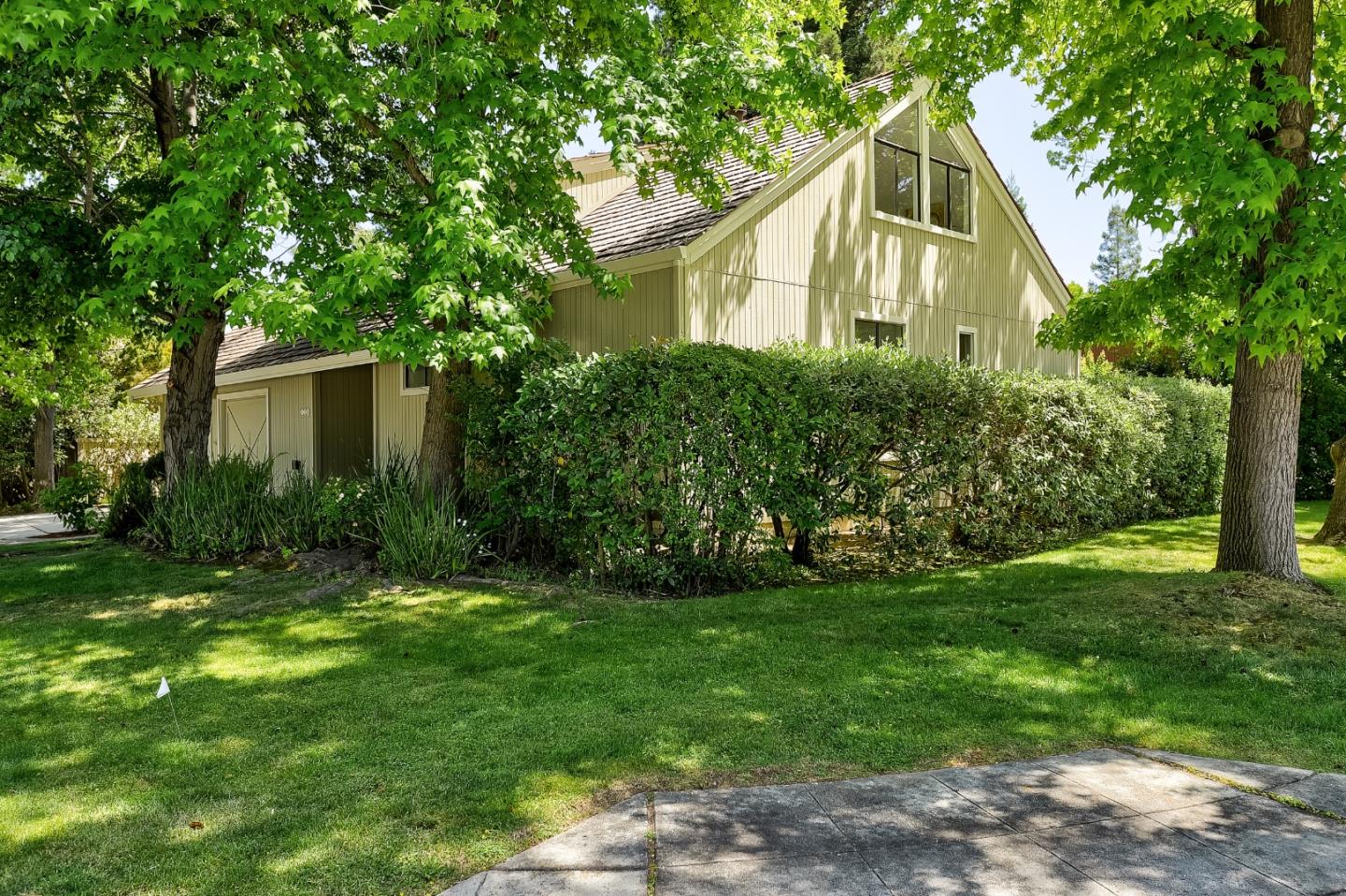 725 Rainbow Drive Mountain View, CA 94041 - Photo 20 of 23 a front view of house with yard and green space