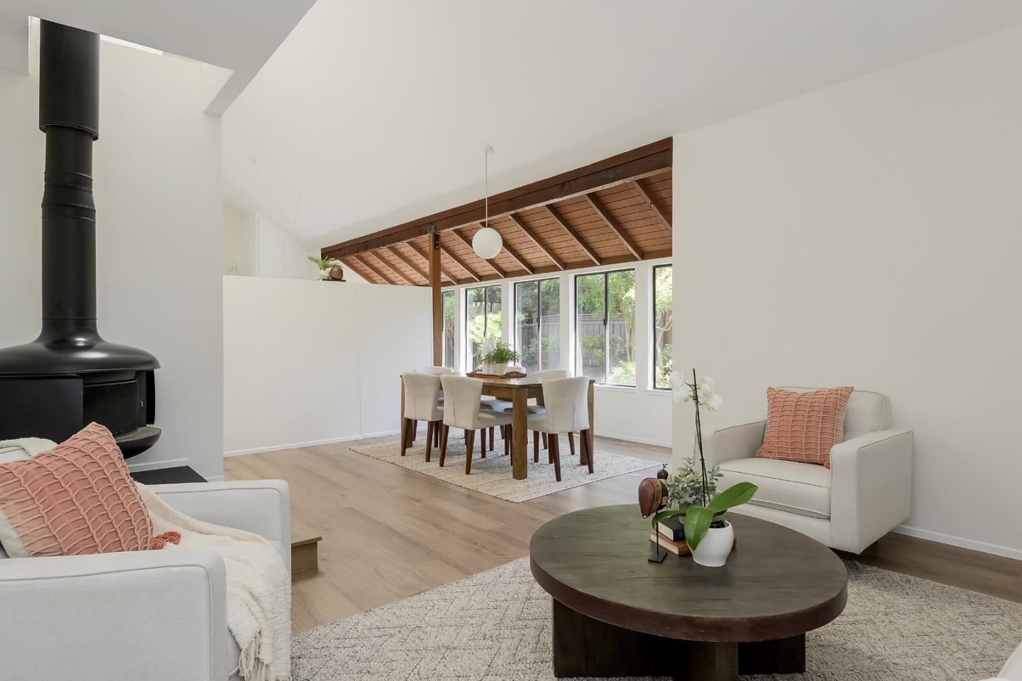 725 Rainbow Drive Mountain View, CA 94041 - Photo 2 of 23 a dining room with furniture and a floor to ceiling window