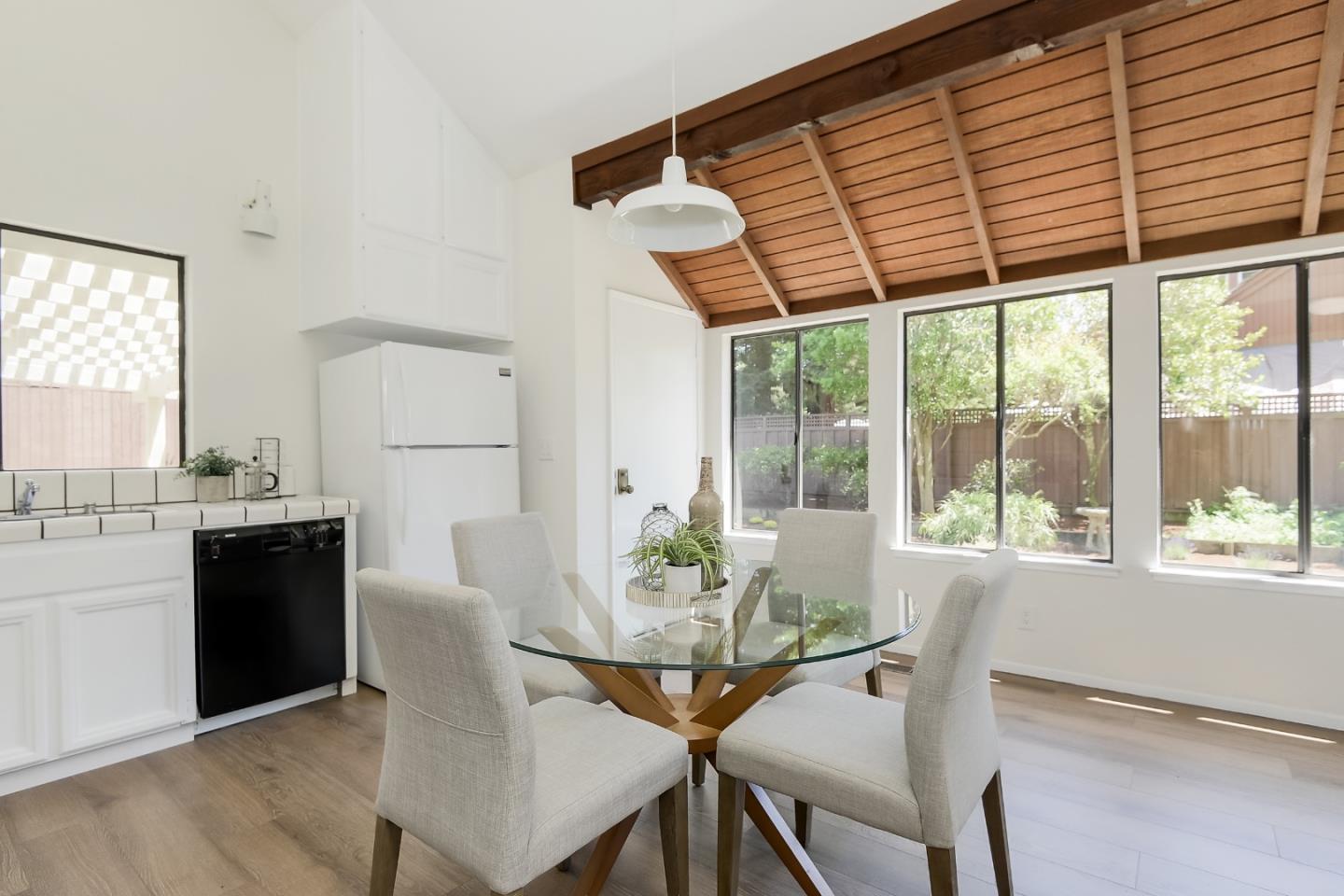 725 Rainbow Drive Mountain View, CA 94041 - Photo 9 of 23 a view of a dining room with furniture window and outside view