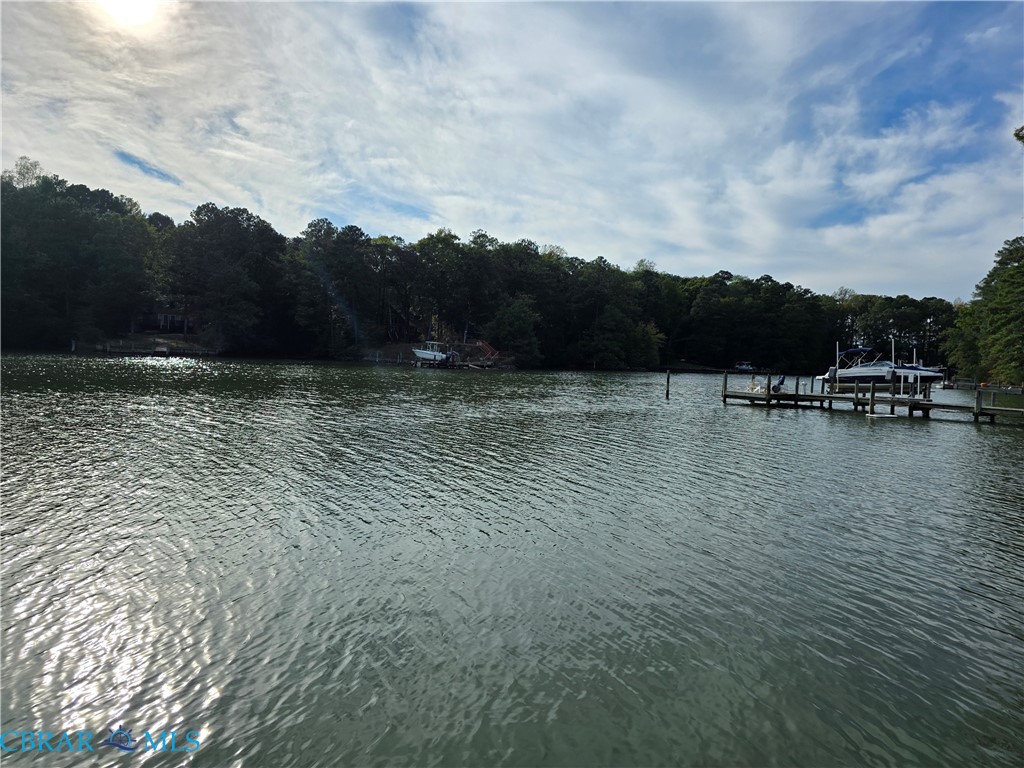 0 Bermuda Road Lancaster, VA 22503 - Photo 8 of 9 Water view featuring a boat dock and a forest