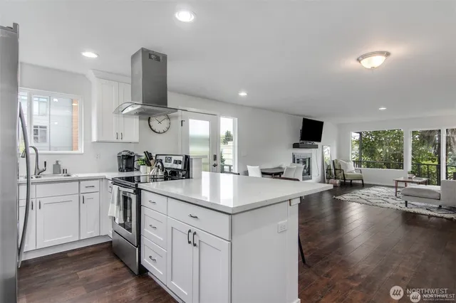 a bedroom with a bed a lamp and a window