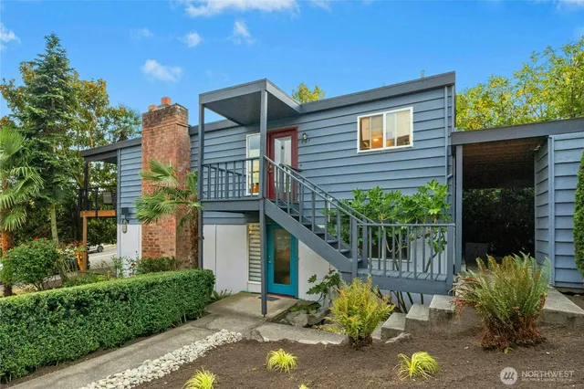 a front view of a house with yard