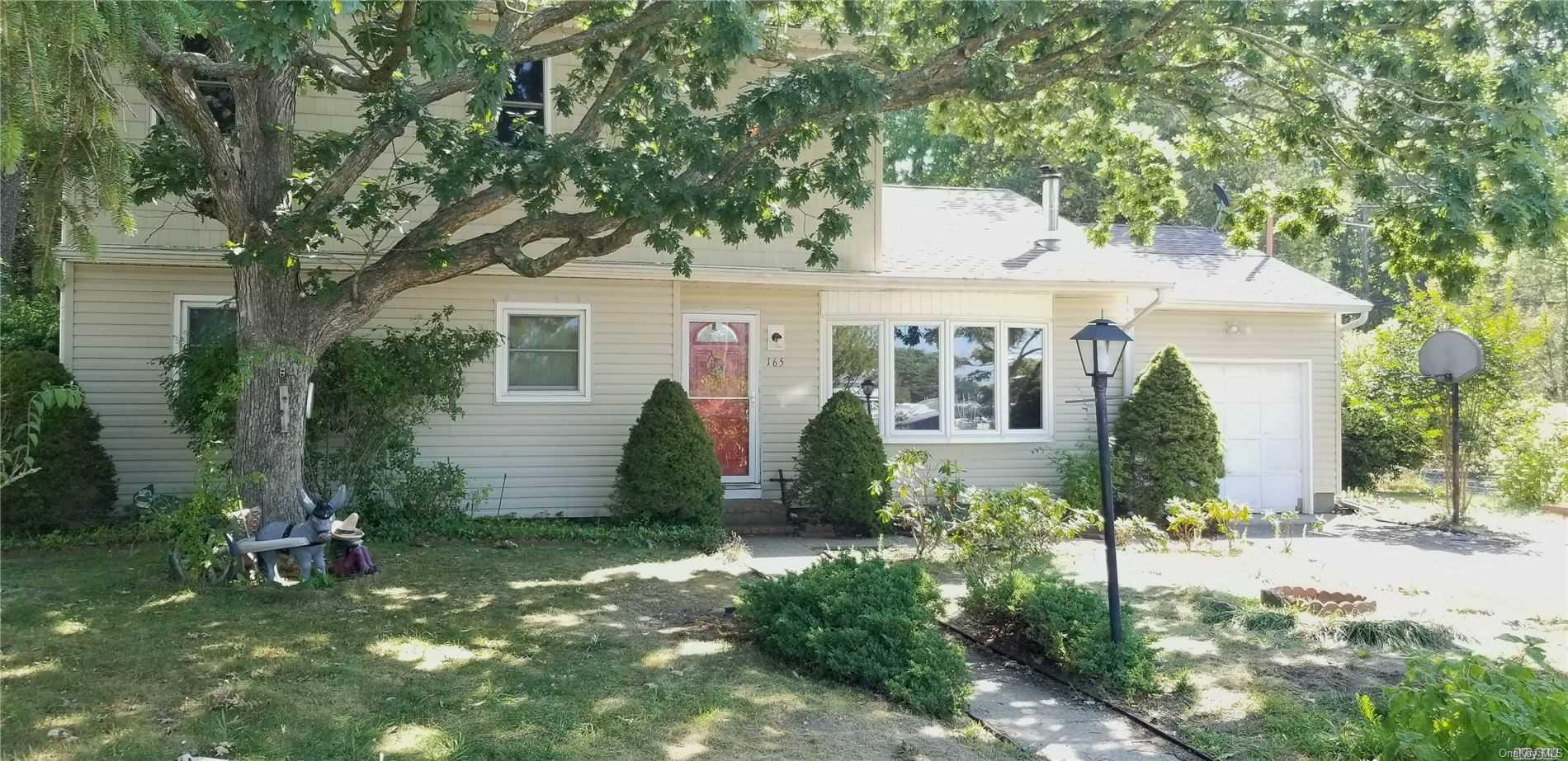 165 Springville Road Hampton Bays, NY 11946 - Photo 1 of 1 Front of house