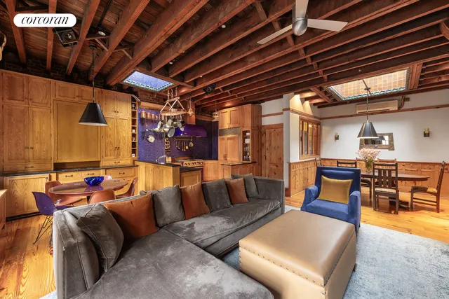 a kitchen with stainless steel appliances granite countertop a sink and cabinets