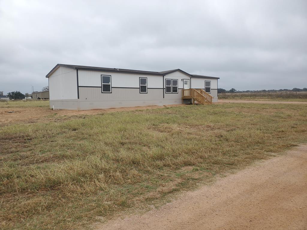 110 Deer Ridge Mason, TX 76856 - Photo 12 of 12 a house view with a garden space