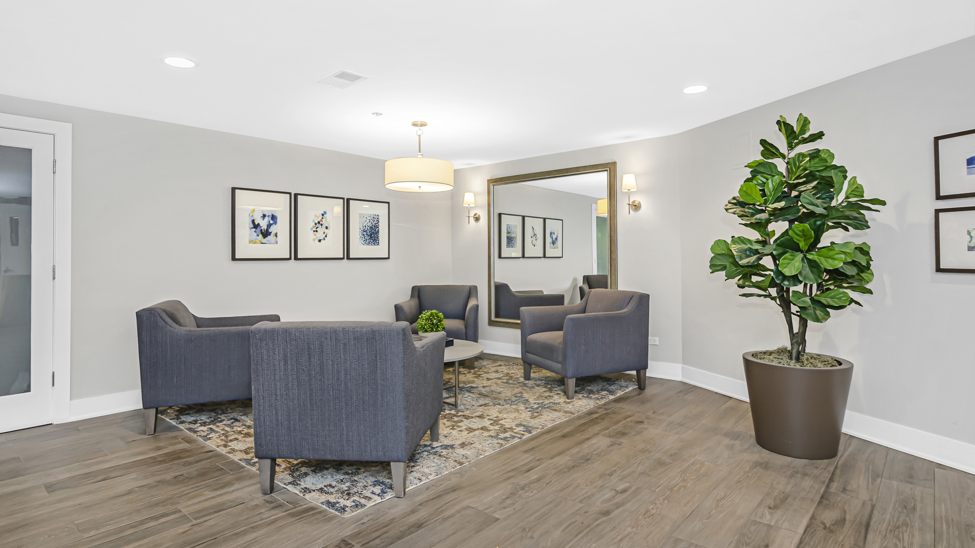 1125 Lake Cook Road, Unit 504E Northbrook, IL 60062 - Photo 3 of 21 a living room with furniture potted plant and a lamp