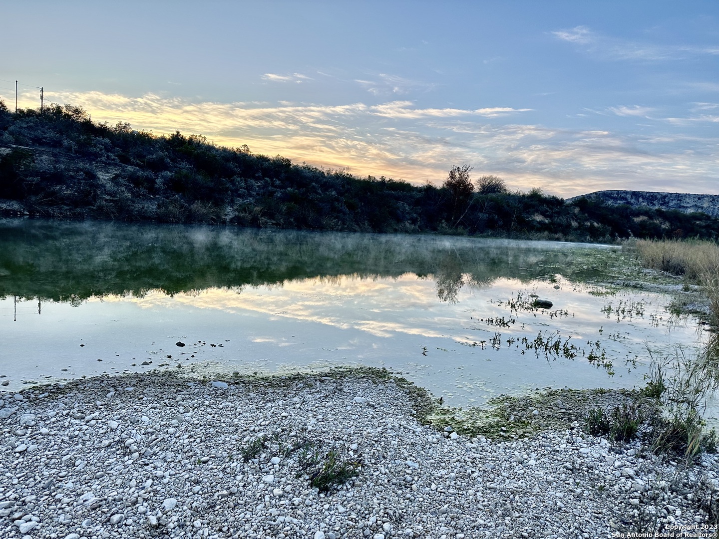 a view of mountain with lake view