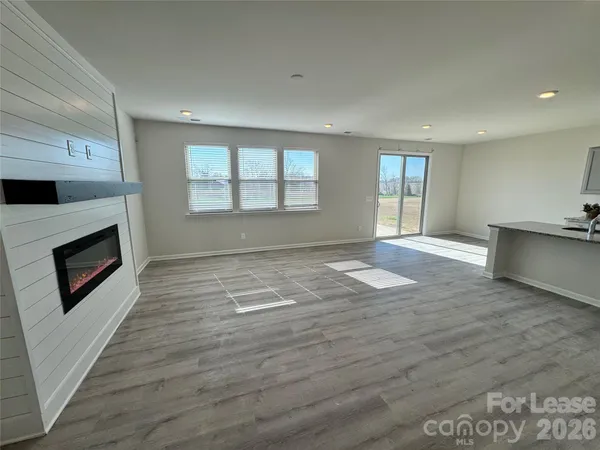a living room with a fireplace