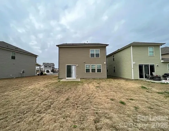 a house view with a outdoor space