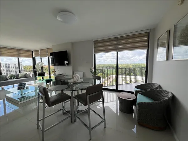 a kitchen with a stove and a refrigerator