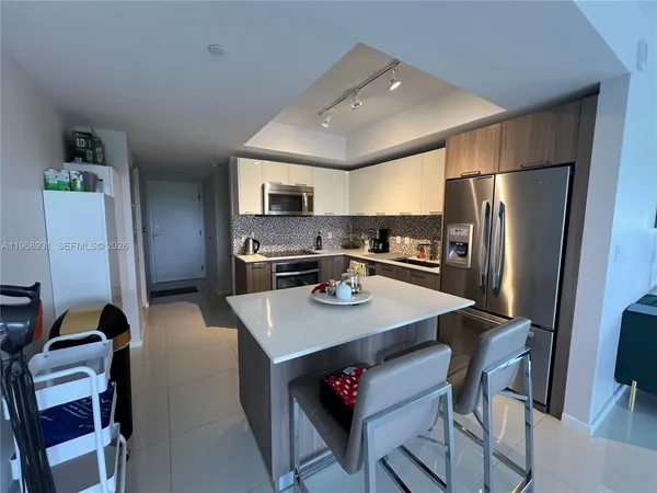 a work room with furniture and window