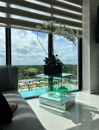 a view of multiple houses with a yard