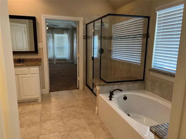 a view of a swimming pool with a yard