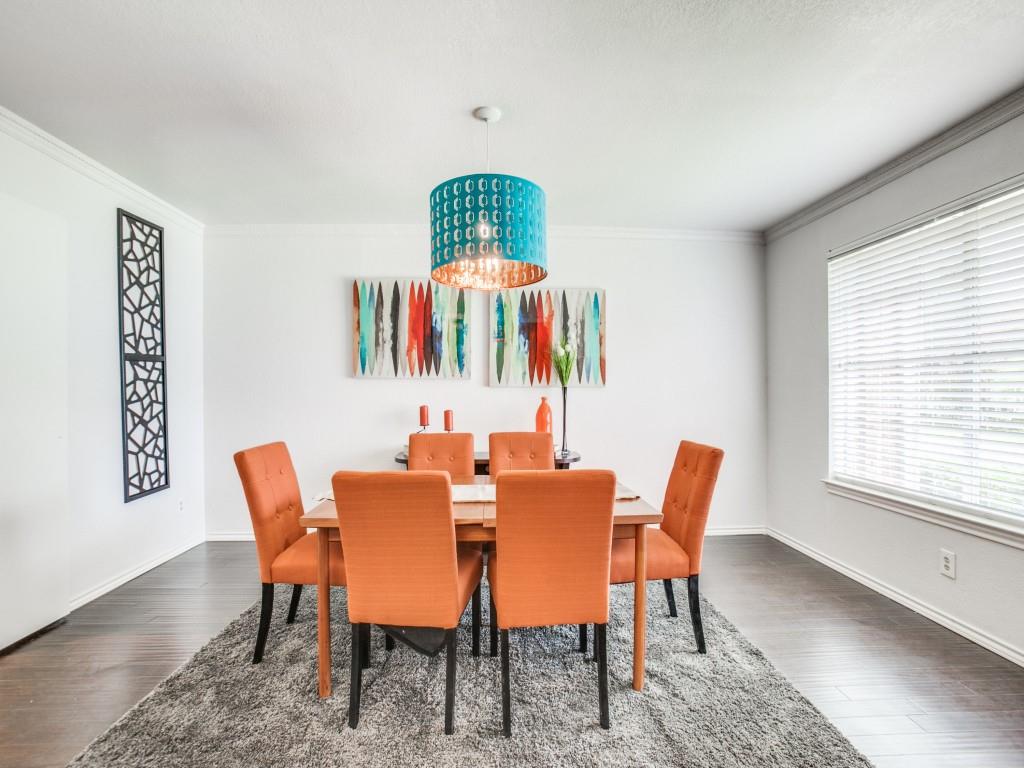 10620 Sandpiper Lane Dallas, TX 75230 - Photo 4 of 12 a dining room with furniture a rug and a window