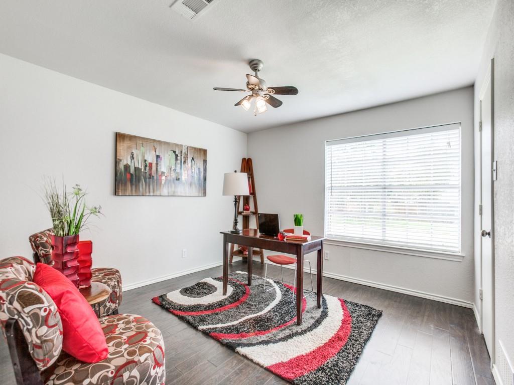10620 Sandpiper Lane Dallas, TX 75230 - Photo 8 of 12 a living room with furniture and a table