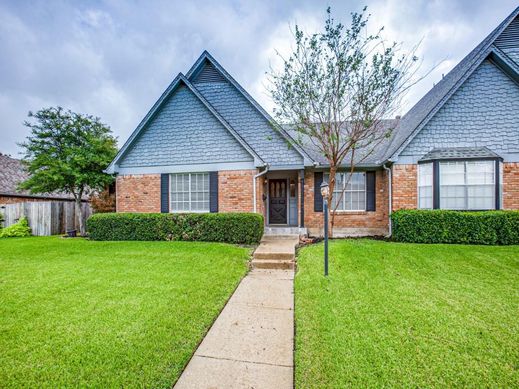 10620 Sandpiper Lane Dallas, TX 75230 - Photo 10 of 12 a view of a house next to a big yard and large trees